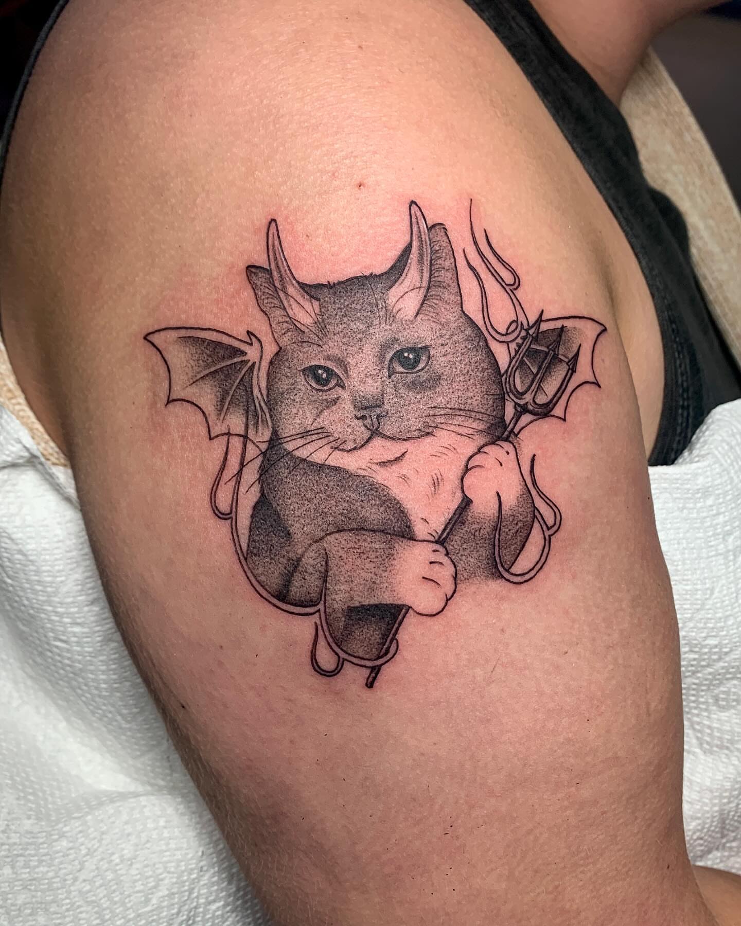 Cat with bat wings dotwork tattoo on the shoulder by ⓣⓞⓡⓘ, Bangor, Maine