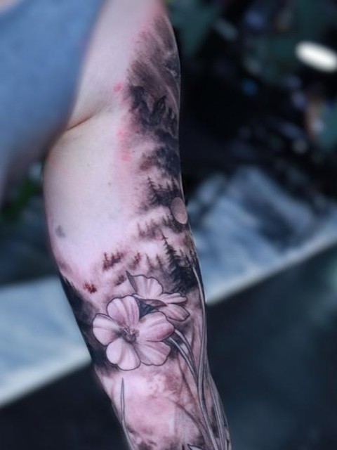 Tattoo by @mikejtattooer22 — realism, black_and_grey