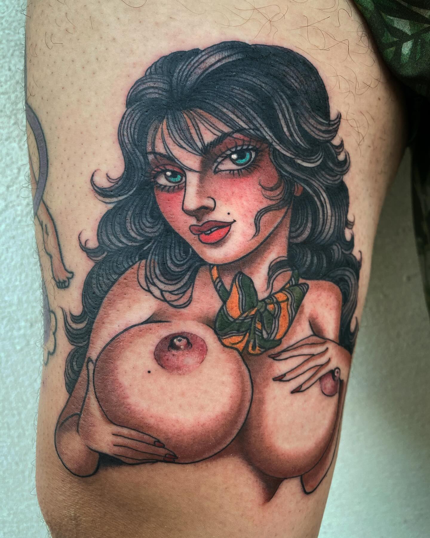 Woman realism tattoo on the thigh by Adam Warmerdam, Los Angeles, California