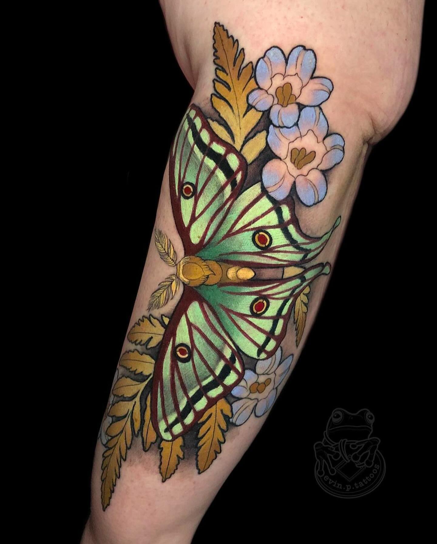 Moth and flowers new school tattoo on the forearm by Evin Pfaff, Bedford, Pennsylvania