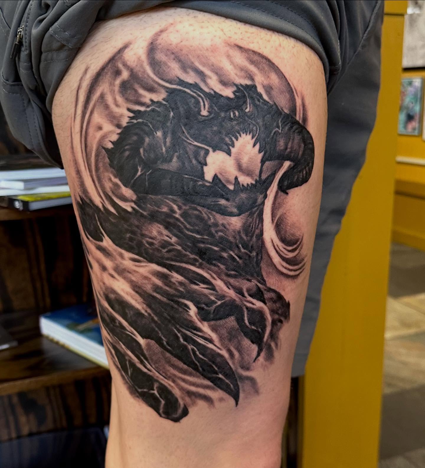 Dragon realism tattoo on the thigh by Comfy Chris Fettig