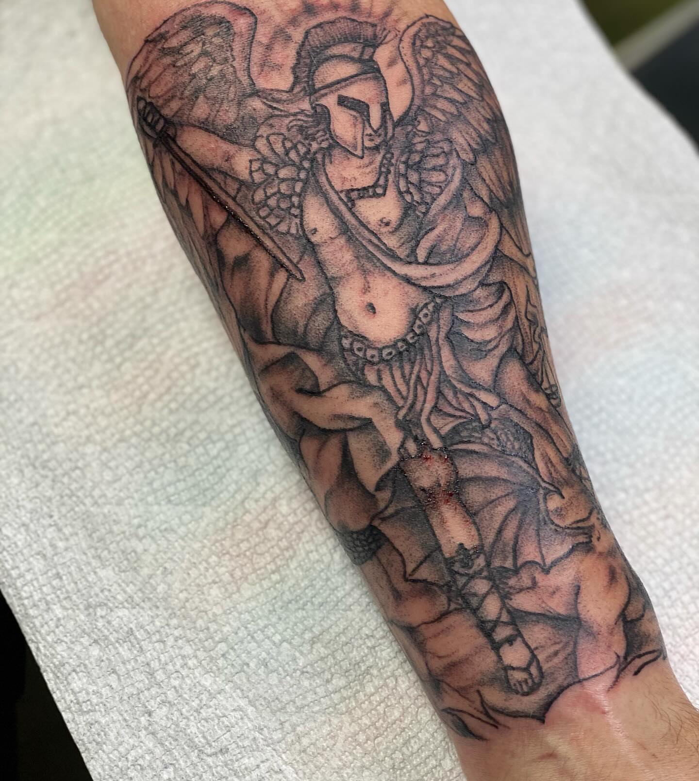 Angelic warrior black and grey tattoo on the forearm by Tattoos By Trish