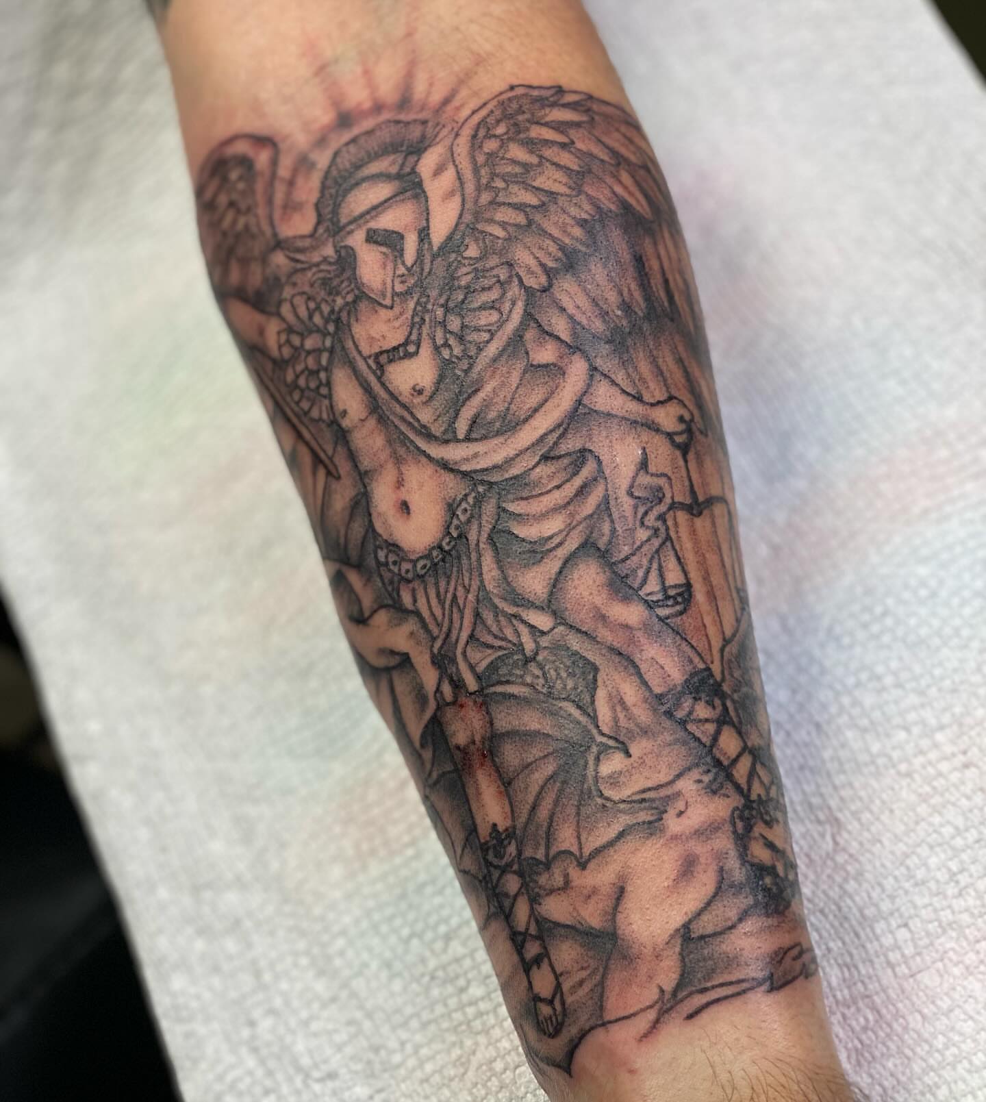 Angelic warrior realism tattoo on the forearm by Tattoos By Trish