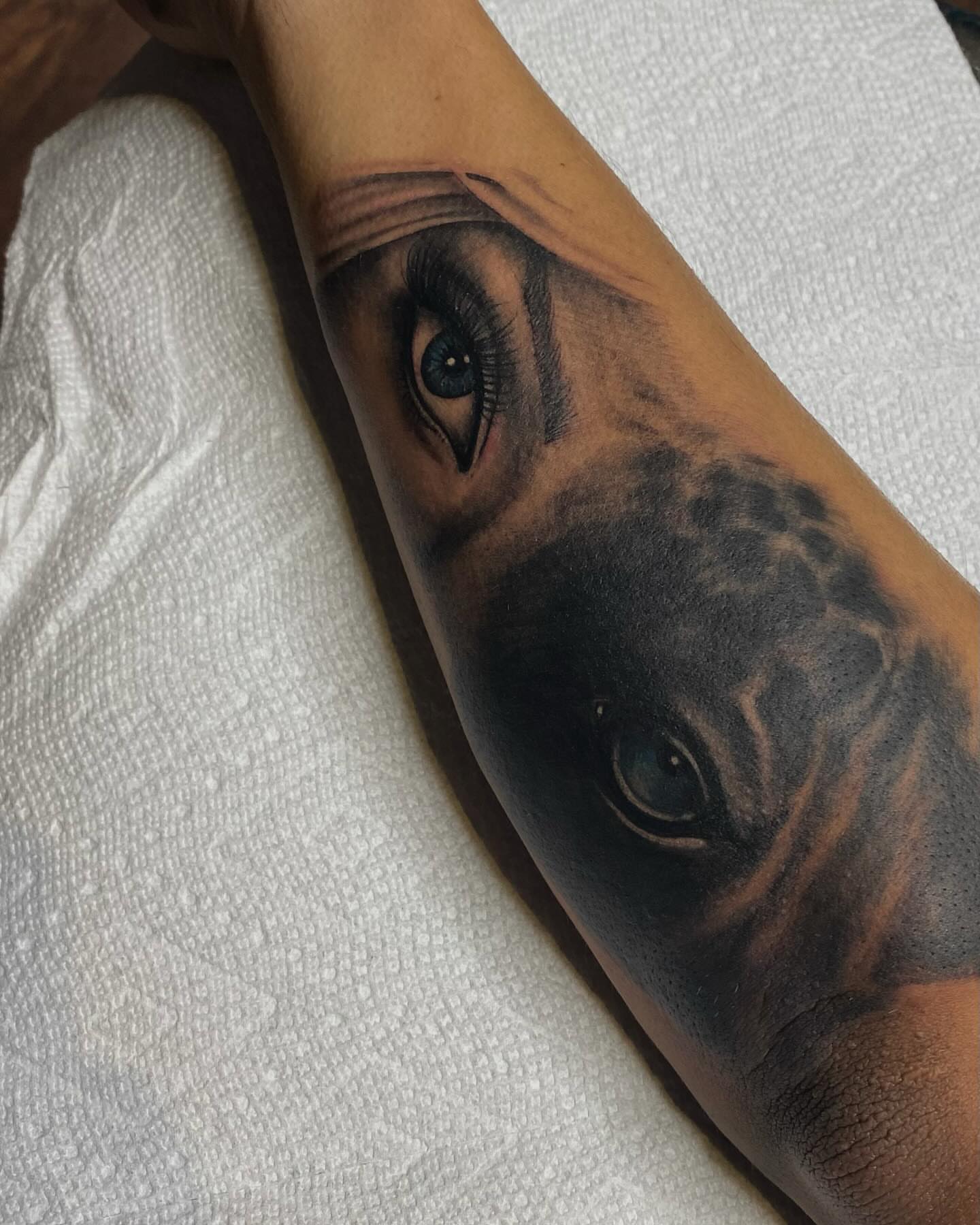 Eye realism tattoo on the forearm by Lady.SINatra