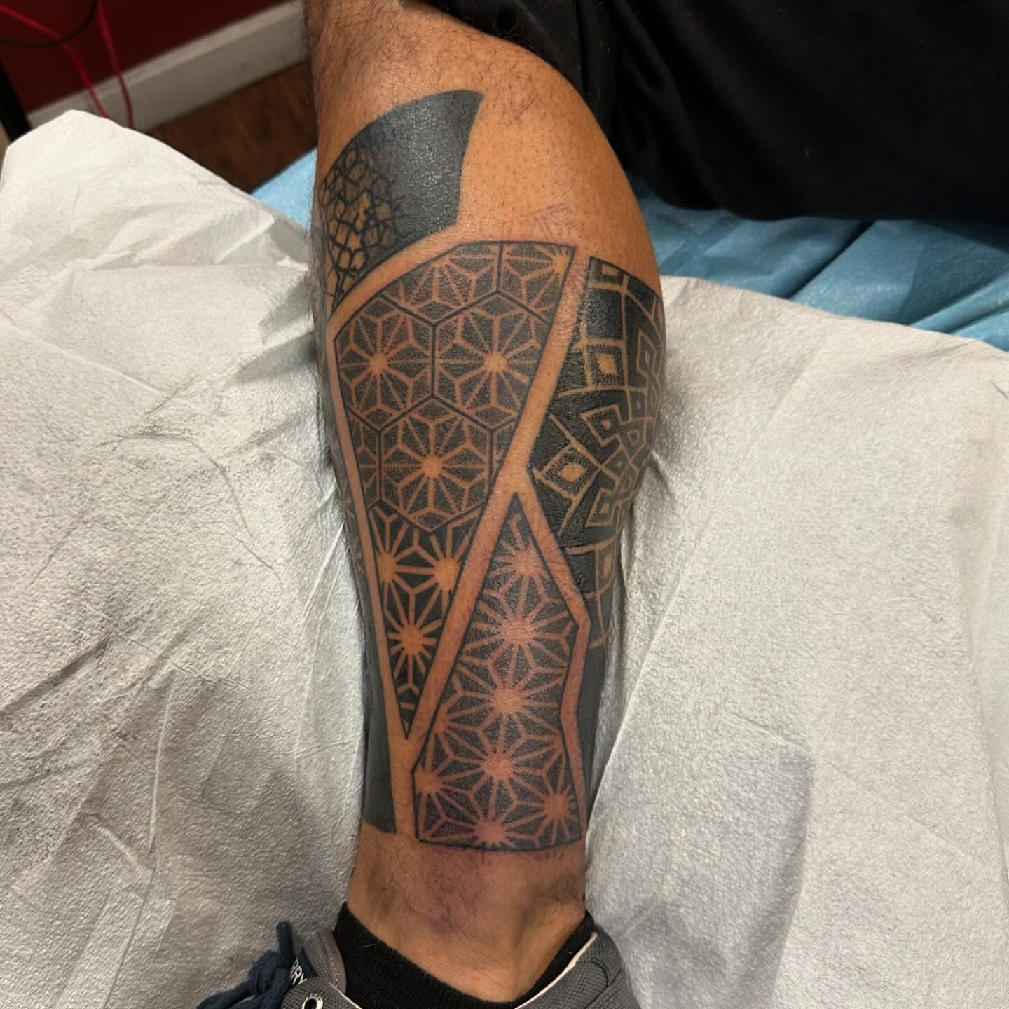 Geometric pattern geometric tattoo on the calf by Jackie
