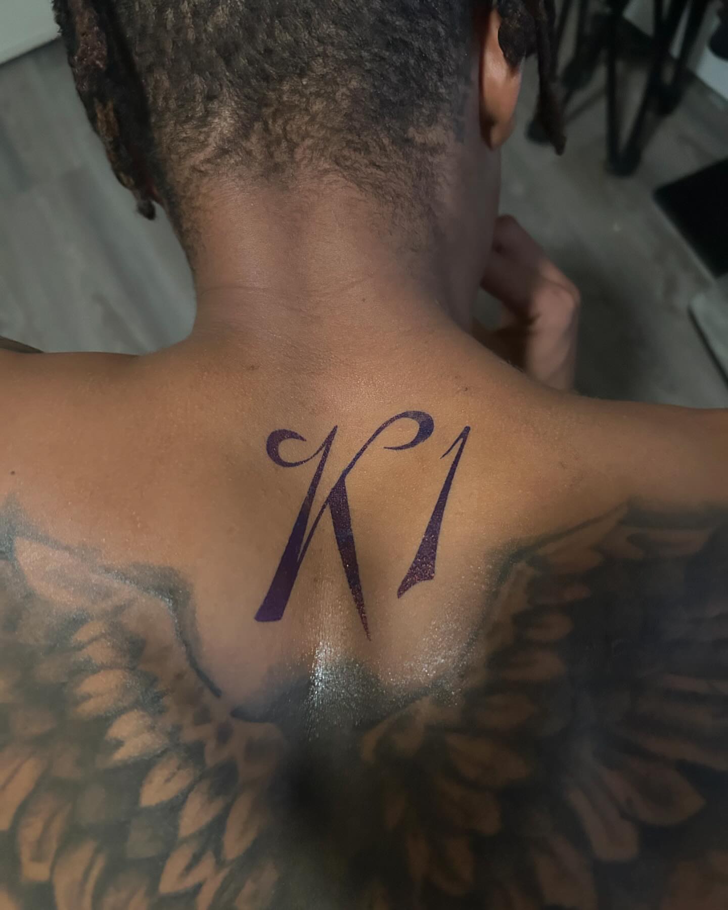 Script lettering lettering script tattoo on the back by Airika Edwards