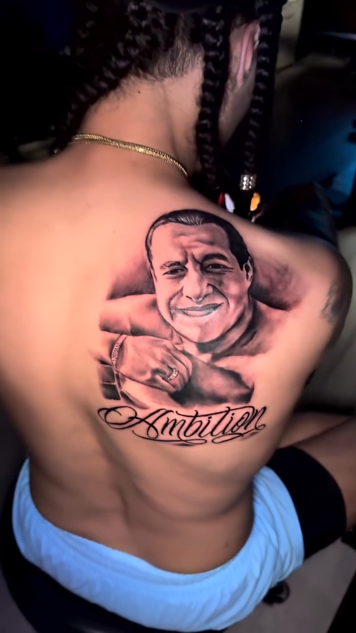 Man and script realism tattoo by Alfonso Duenas