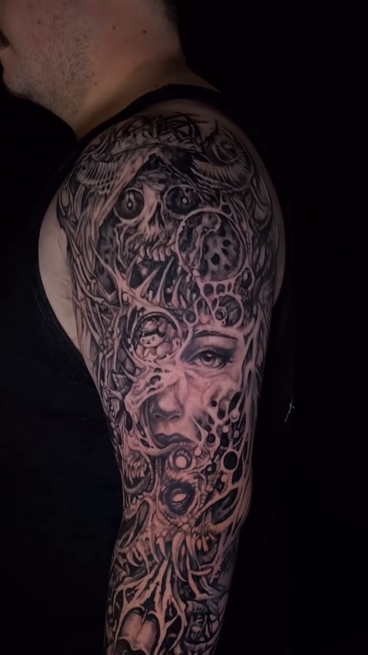 Surreal portrait with mechanical elements dark realism tattoo by Alia