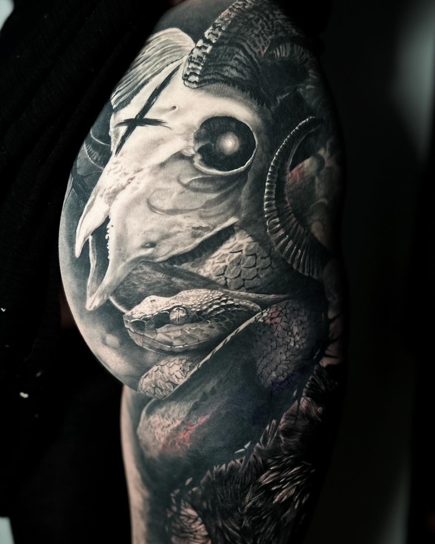 Fish and snake realism tattoo on the forearm by Eltche Art Tattoo