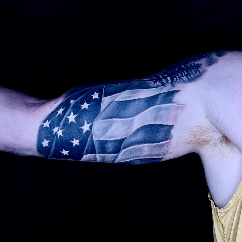 American flag American traditional tattoo on the forearm by James Reed Tattoo artist