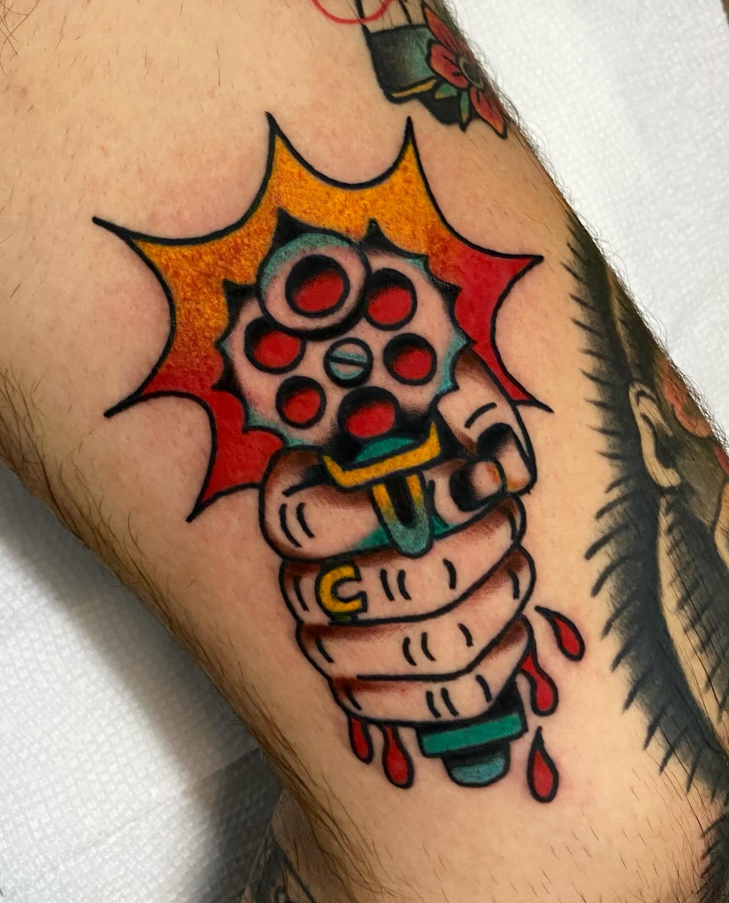 Hand grenade American traditional tattoo on the forearm by Shana