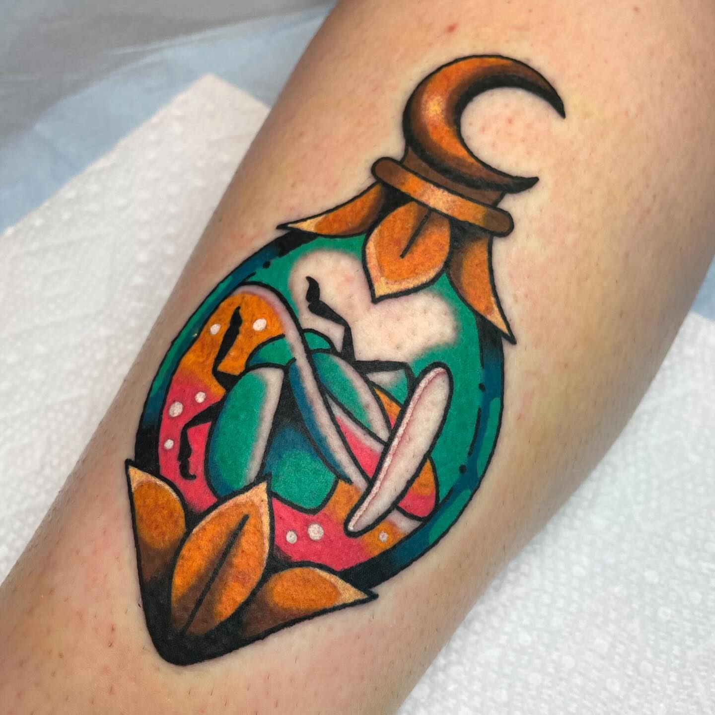 Mermaid American traditional tattoo on the forearm by Nova Vaughn