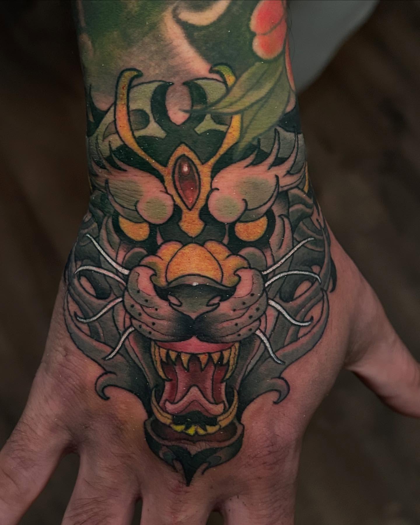 Panther American traditional tattoo on the hand by Marvin Silva