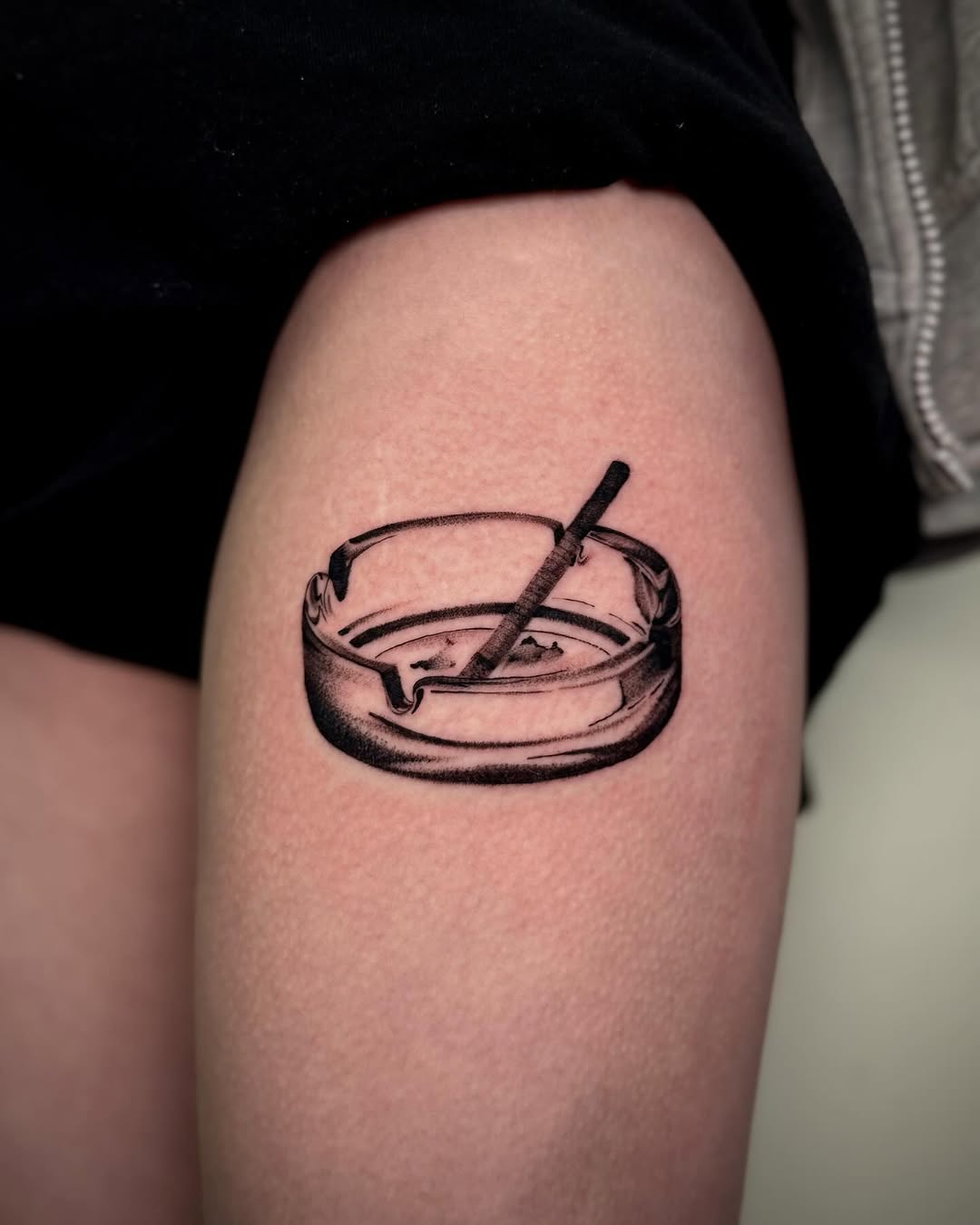Tattoo by @slightlyorange — black_and_grey, realism