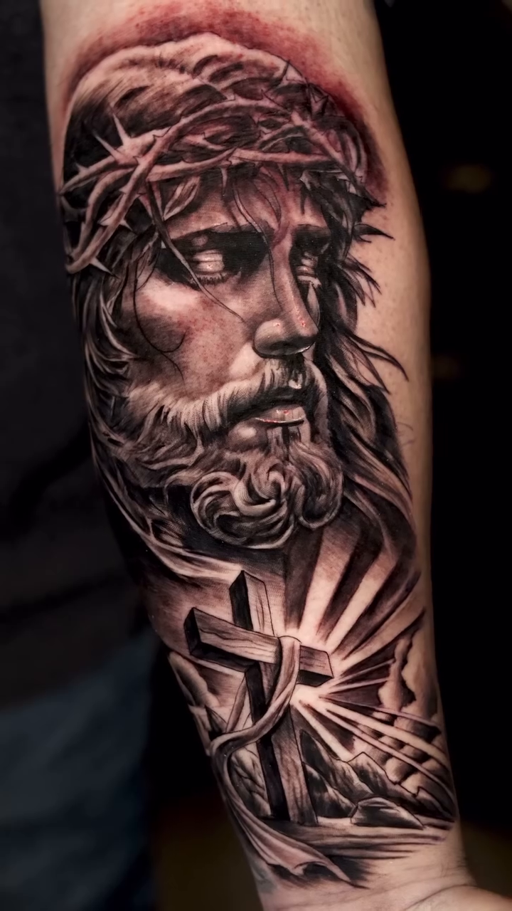 Jesus Christ with cross realism tattoo by Luis Arenas