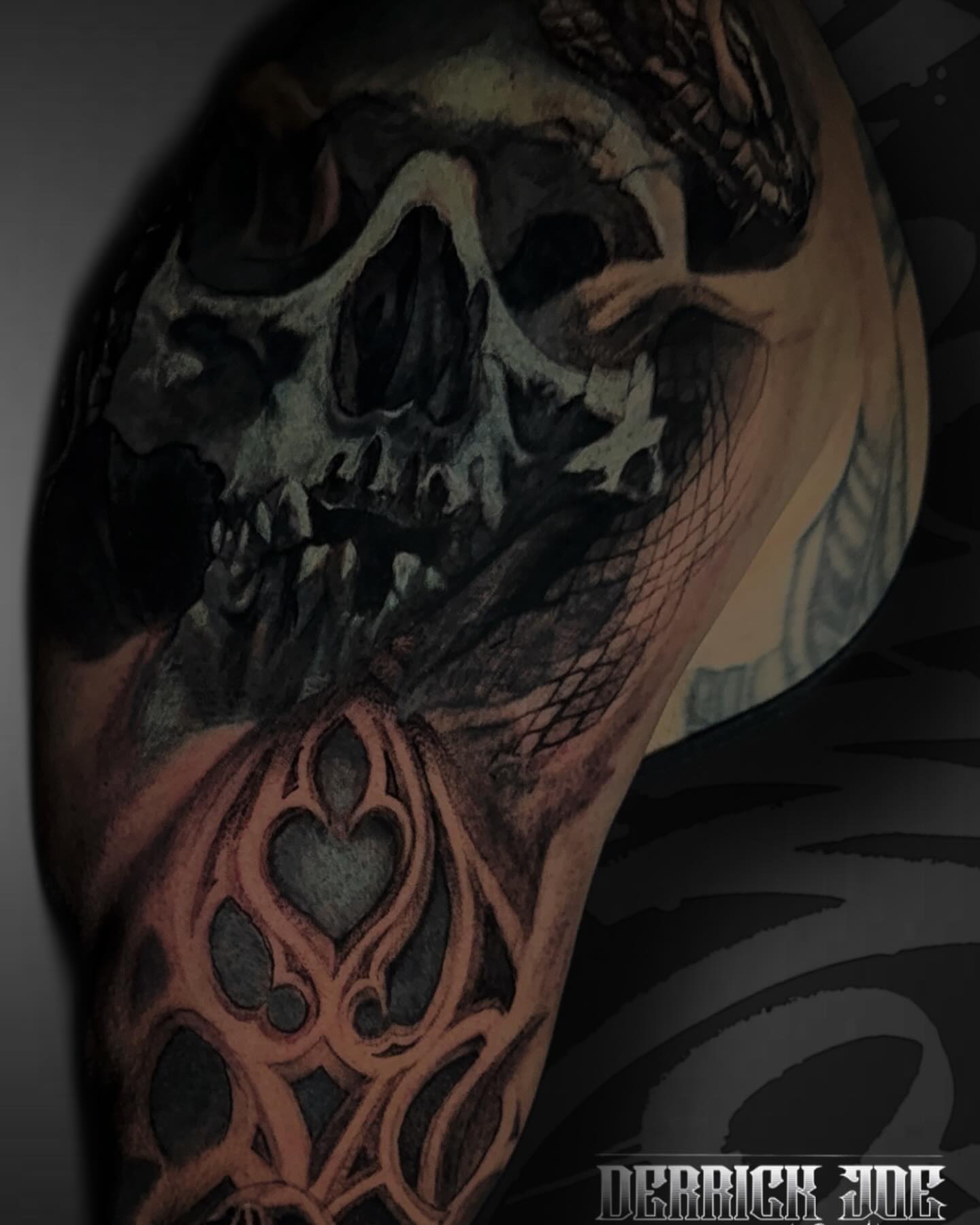 Skull dark realism tattoo on the forearm by Derrick Joe tattoos