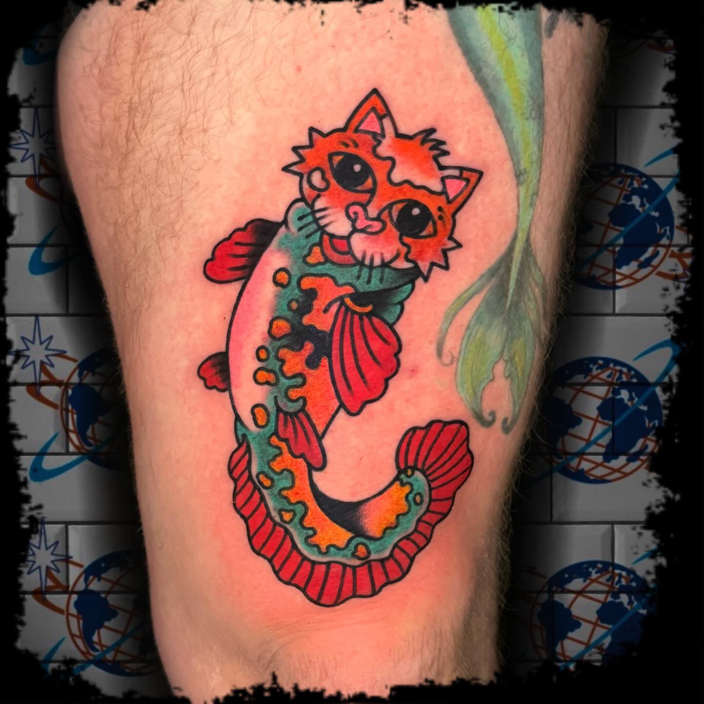 Cat American traditional tattoo on the thigh by Antonio DeCaro