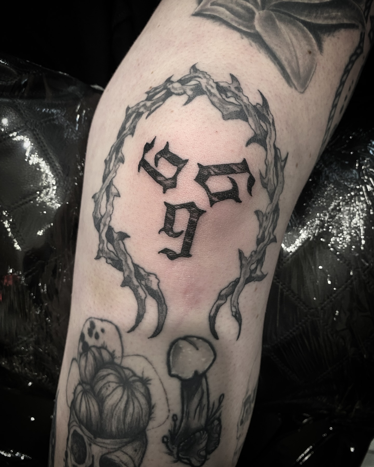 Tattoo by @chrisdafacetattoo — black_and_grey