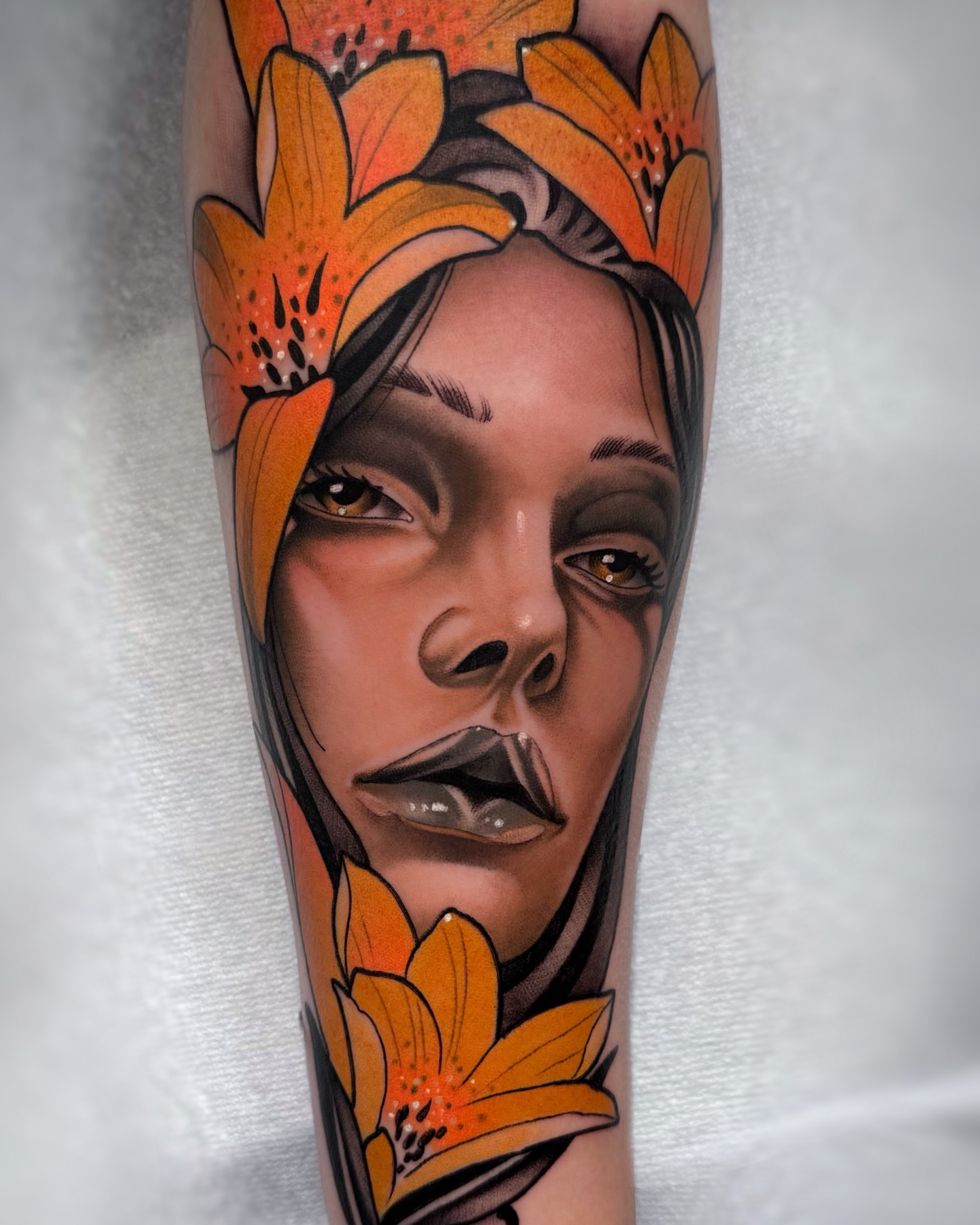 Portrait with flowers realism tattoo on the forearm by Aitor Arie, Roseville, California