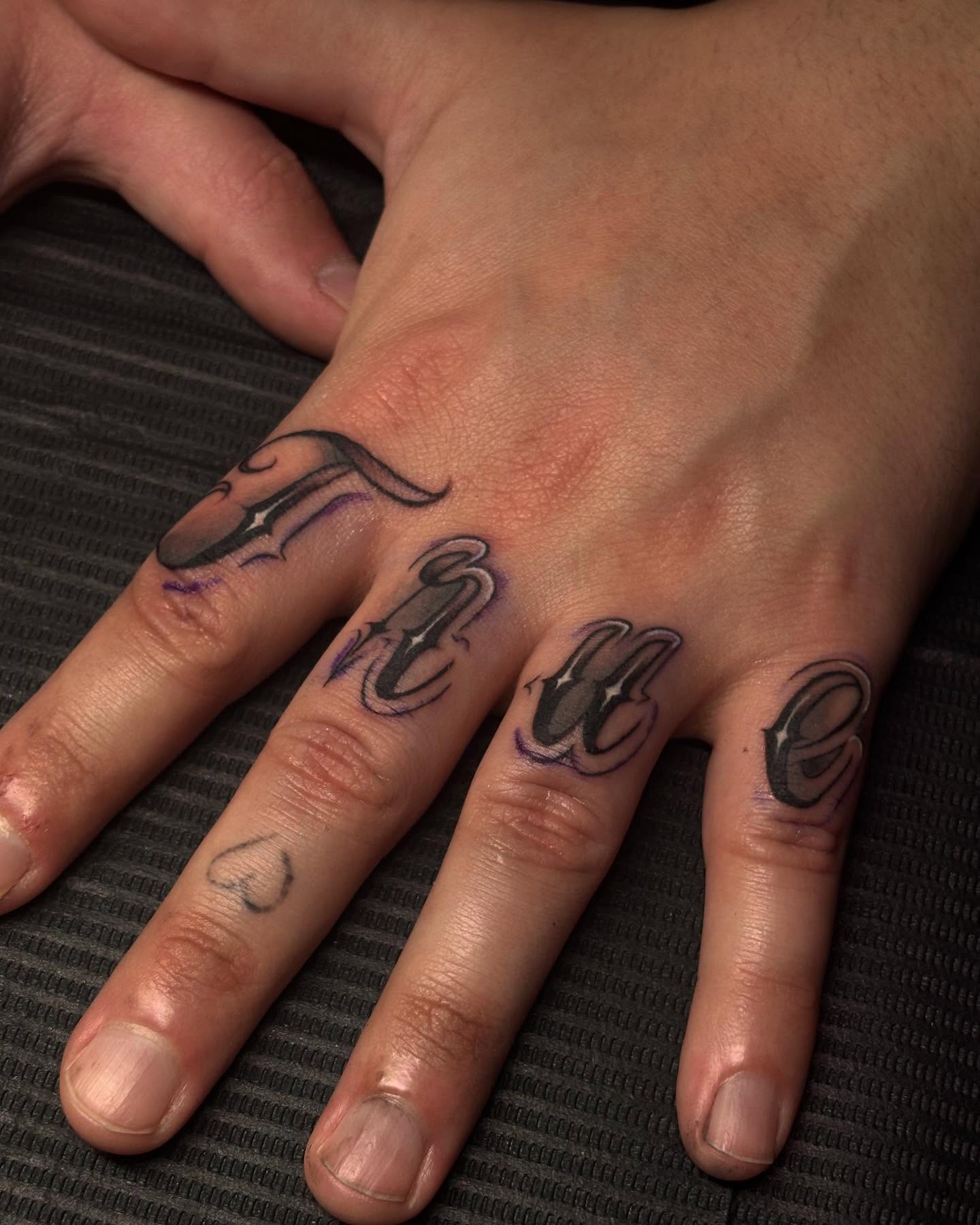 Lettering lettering script tattoo on the hand by Gabby Finearts