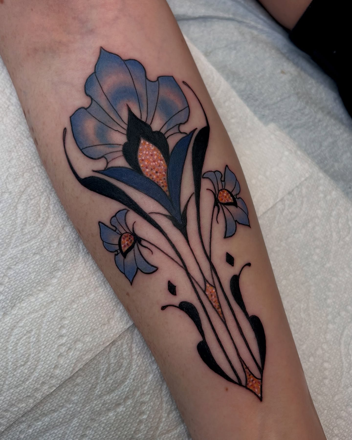 Floral arrangement dotwork tattoo on the forearm by Laura Babsie