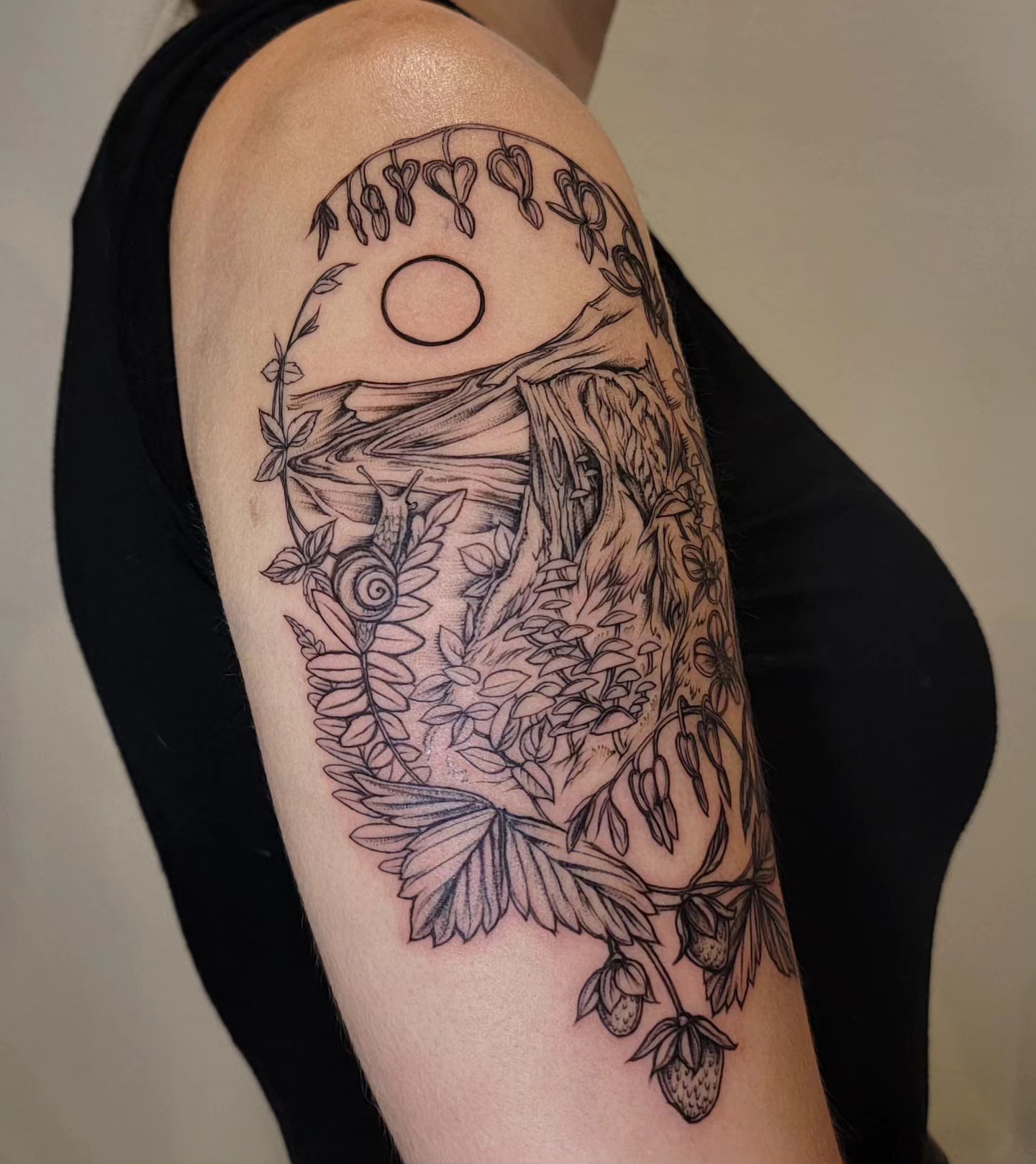 Forest landscape realism tattoo on the upper arm by Sierra (cc) Klein