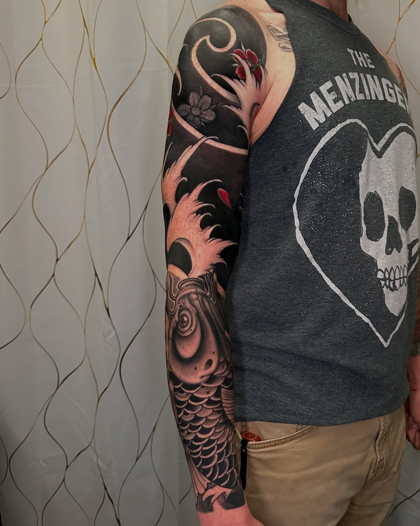 Koi fish japanese irezumi tattoo on the upper arm by Ty Pallotta, Austin, Texas