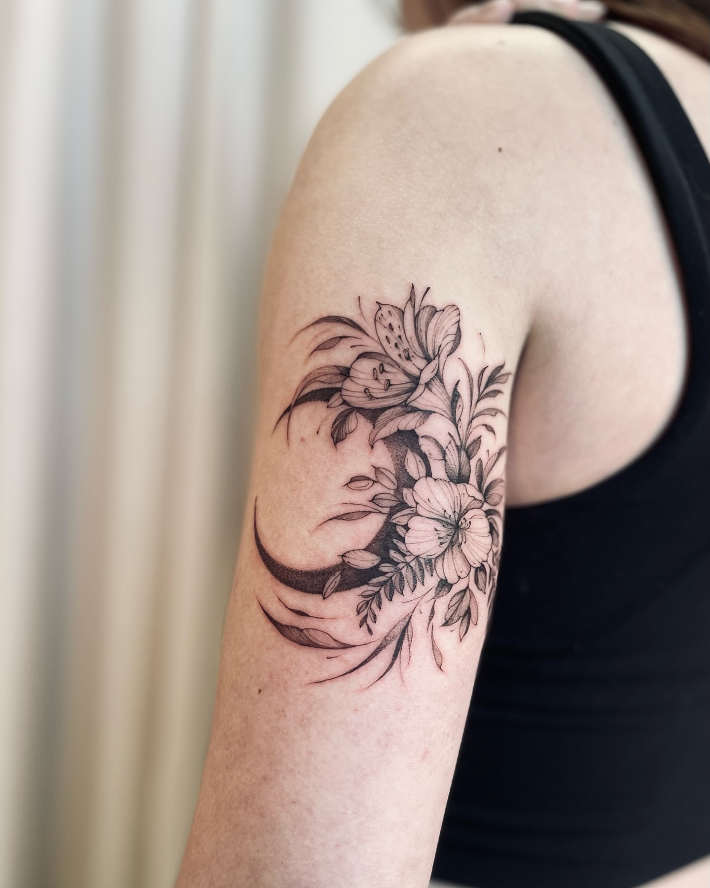Flowers black and grey tattoo on the shoulder by Dung Ngo