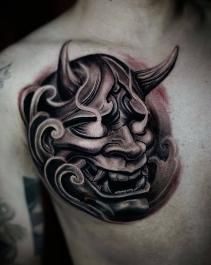 Demon mask japanese irezumi tattoo on the shoulder by Peter John