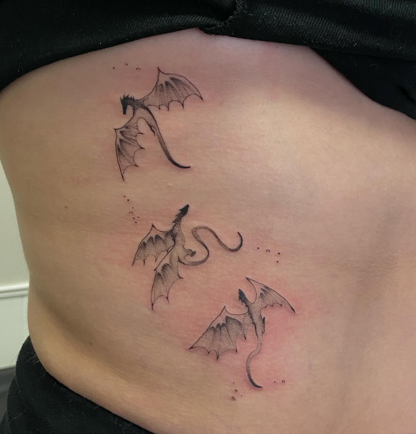 Dragons black and grey tattoo on the ribs by Libbey June @ Snailberry Studios- NW OHIO