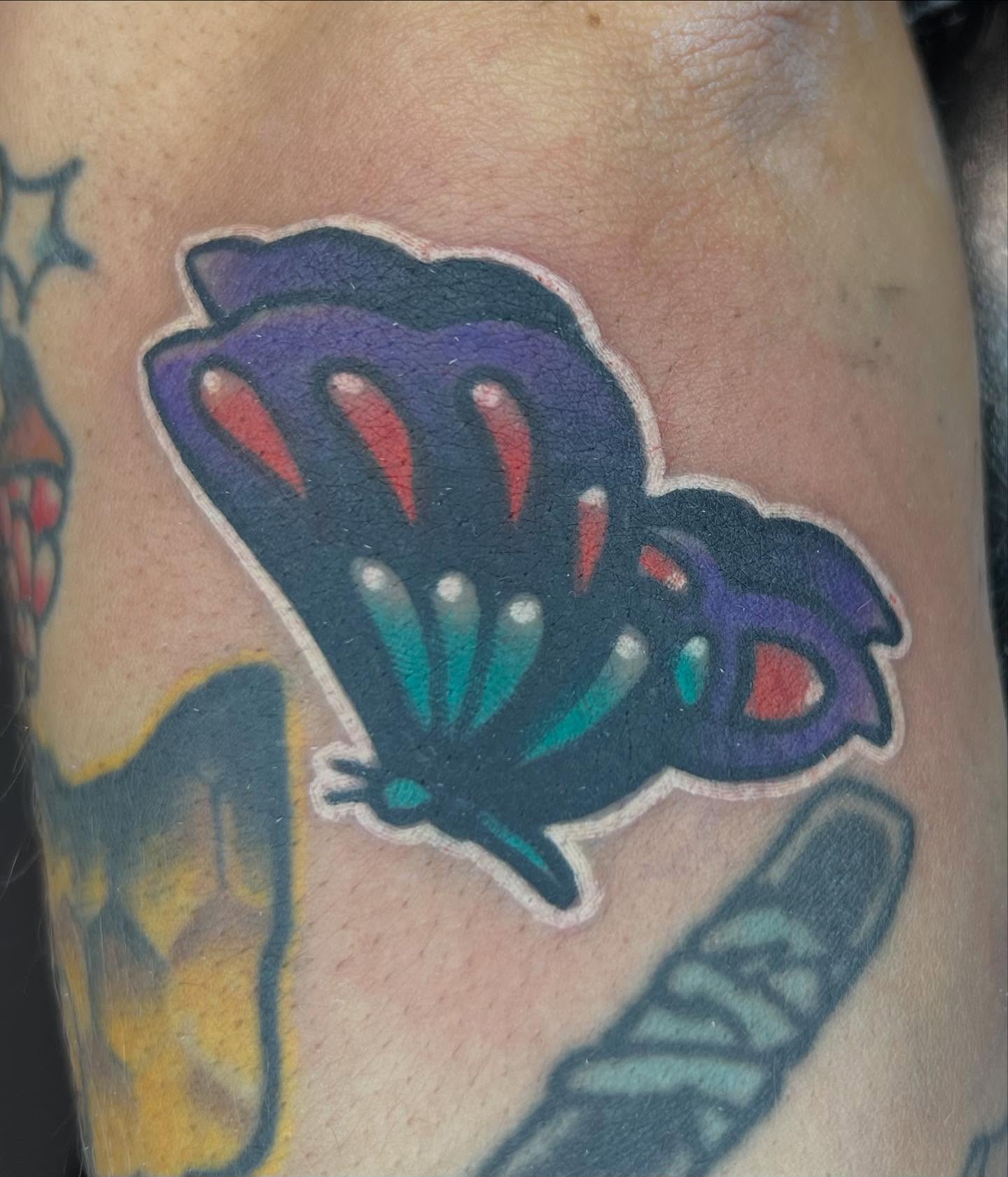 Butterfly American traditional tattoo on the forearm by Will Eagle