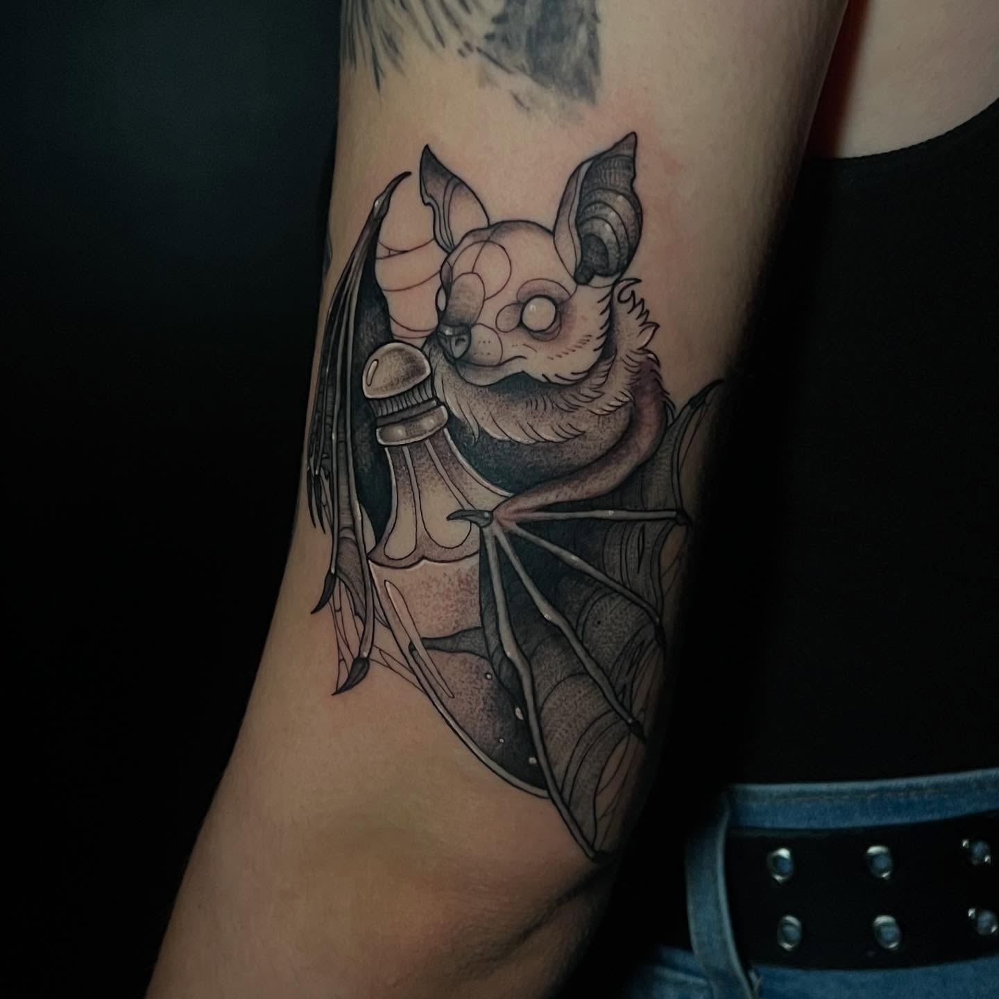 Bat black and grey tattoo on the forearm by Brooke, Kansas City, Missouri