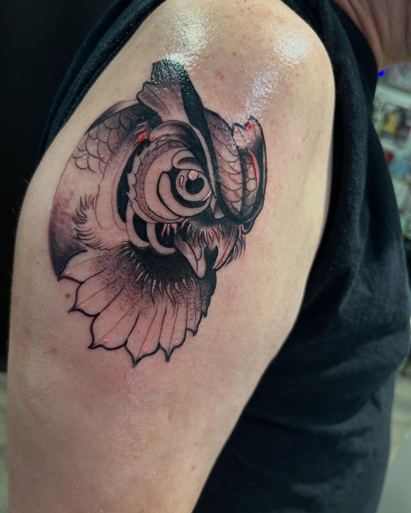 Koi fish black and grey tattoo on the shoulder by Edward A. Boesch