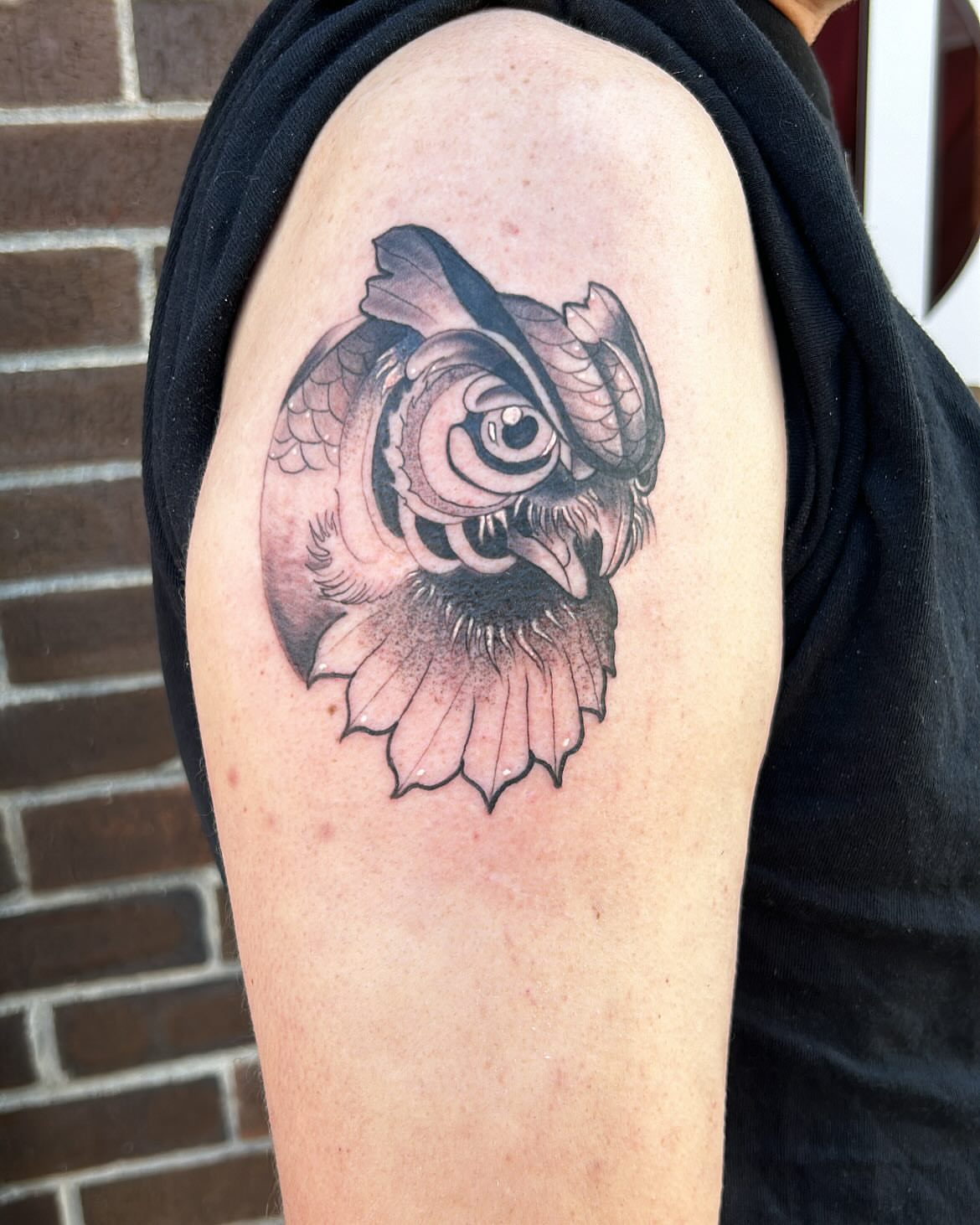 Fish black and grey tattoo on the shoulder by Edward A. Boesch