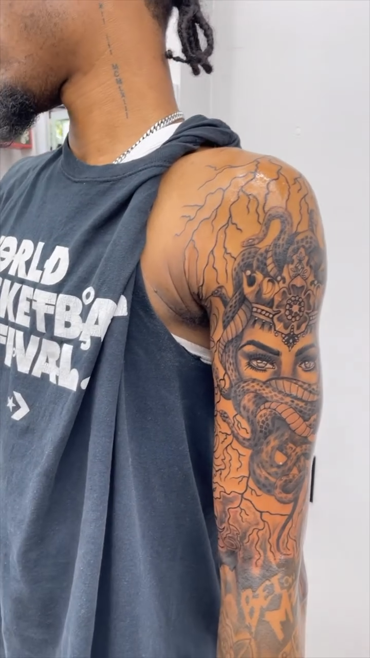 Tattoo by @thecatrinaink — black_and_grey, realism
