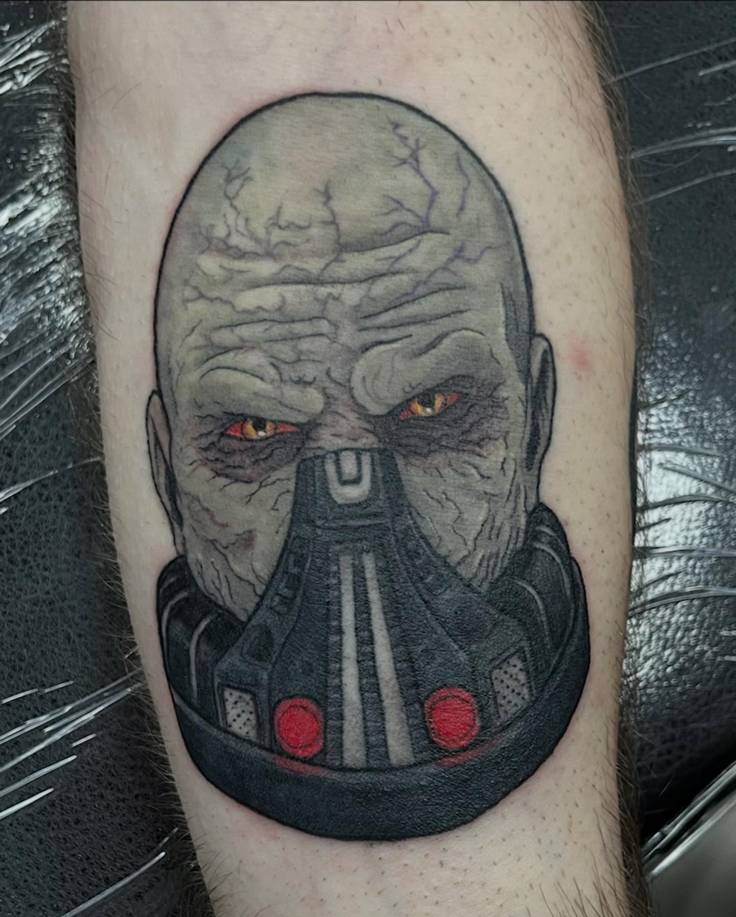 Bane mask dark realism tattoo on the forearm by Tattoos by Gina Palladino