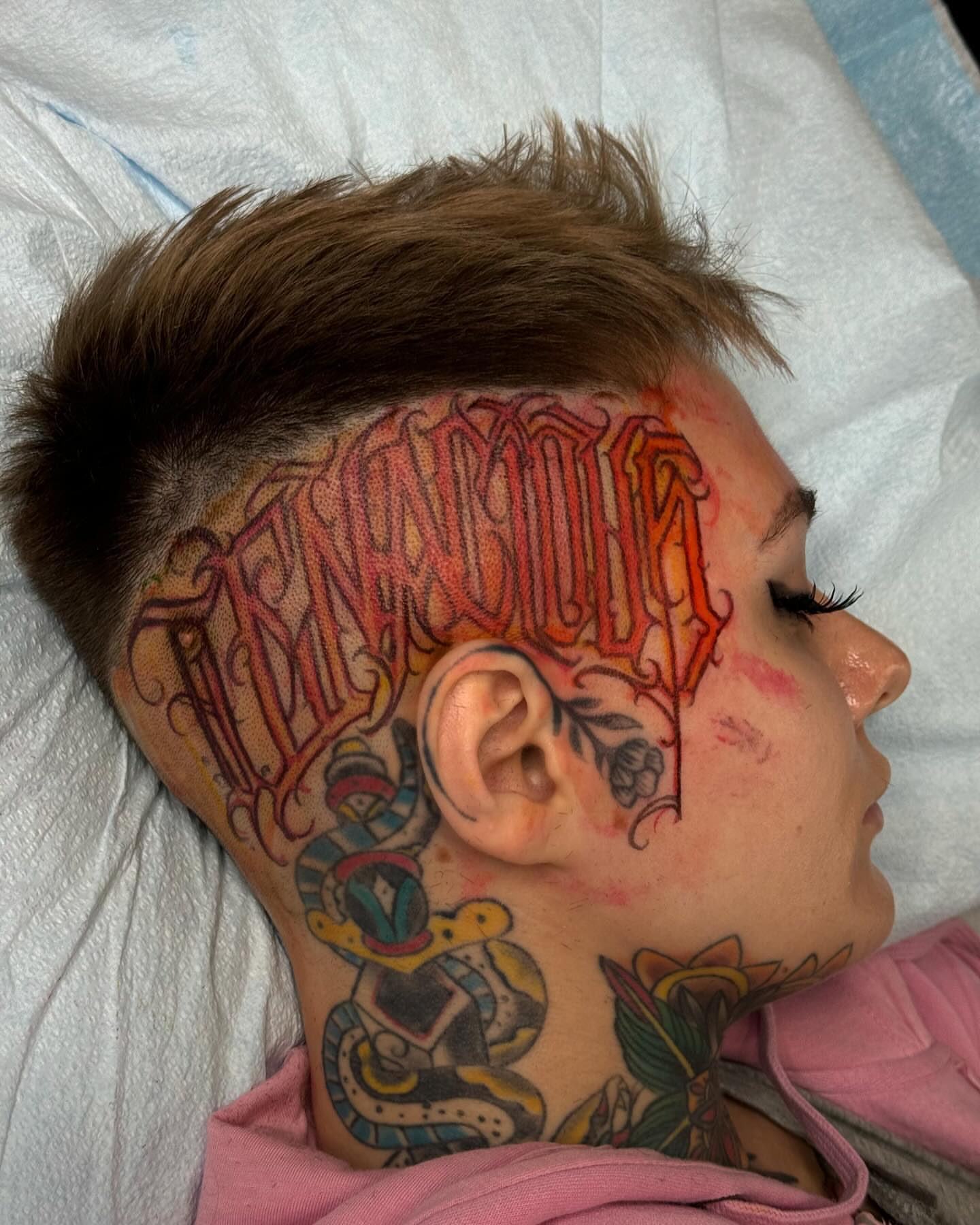 Script lettering lettering script tattoo on the head by Evan Wyatt