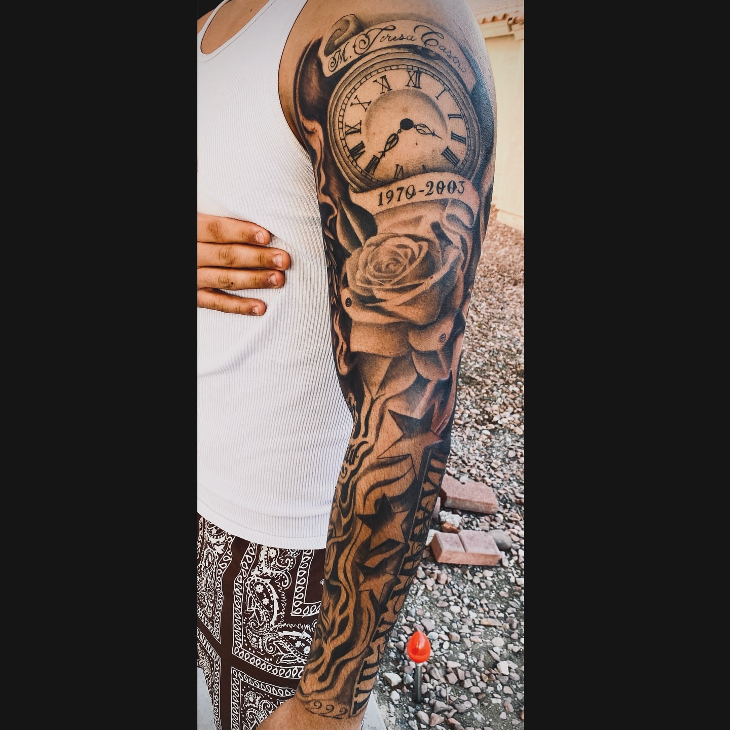 Clock and rose realism tattoo on the forearm by Nessa, Las Vegas, Nevada