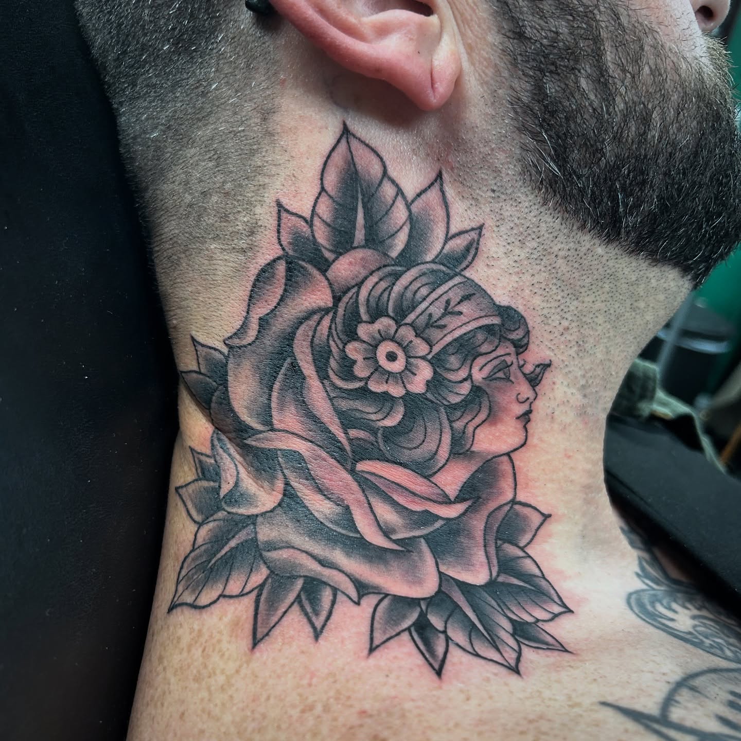 Rose and woman American traditional tattoo on the neck by Patricia Cunningham
