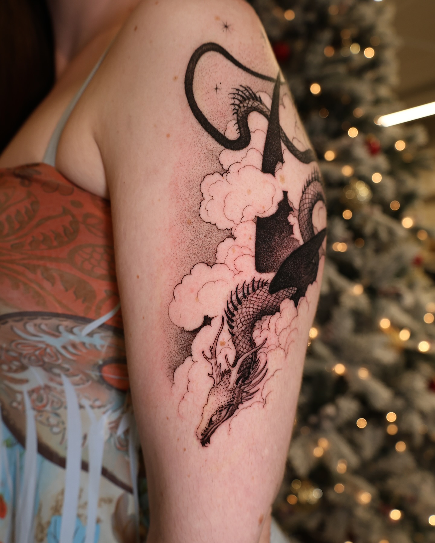 Dragon dotwork tattoo on the forearm by Strokin Konstantin