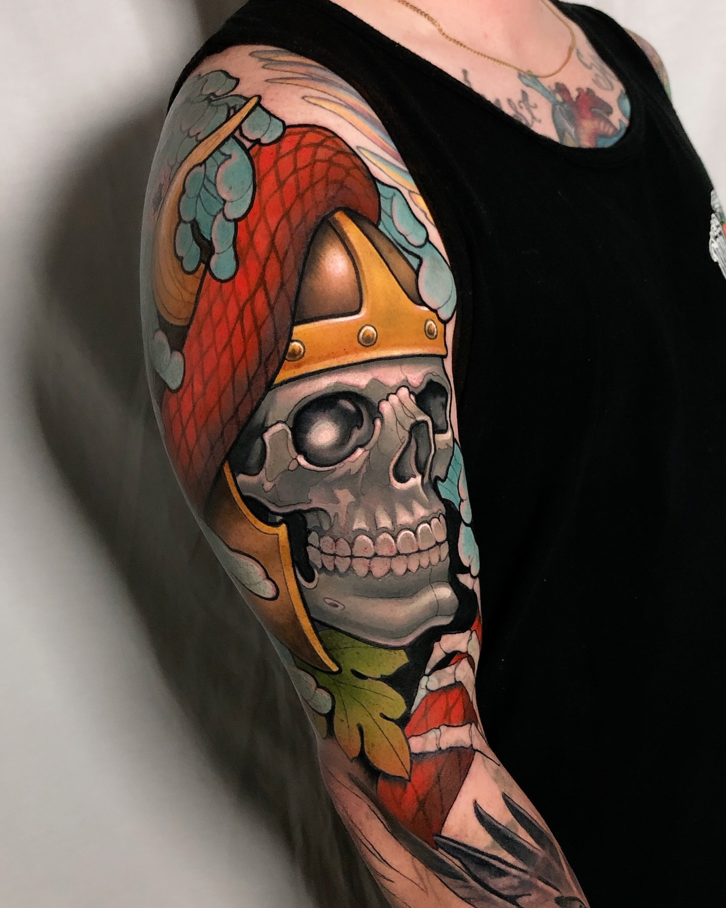 Viking skull realism tattoo on the upper arm by Milo Alfring Tattoo