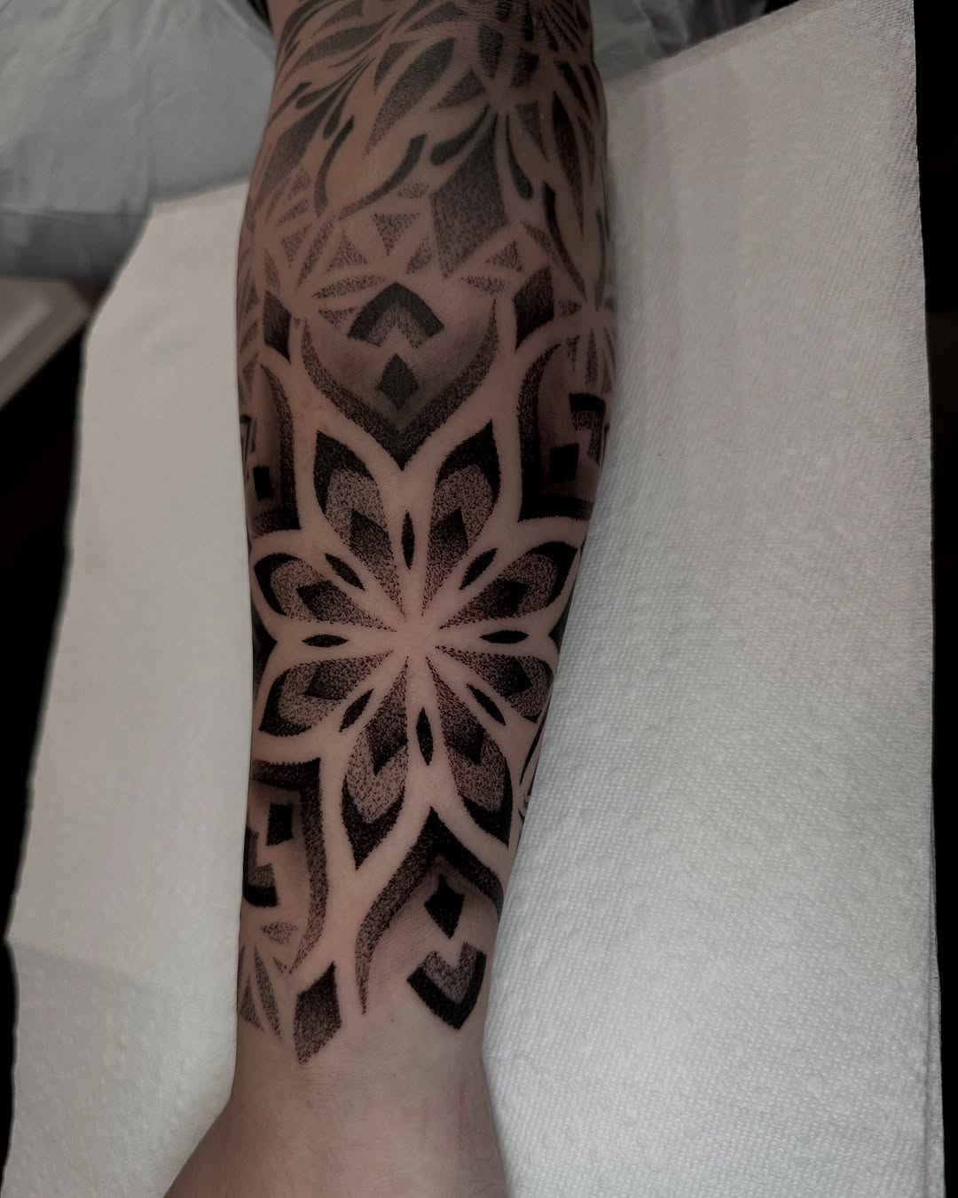 Tattoo by @dayana_tattooartist — geometric, dotwork