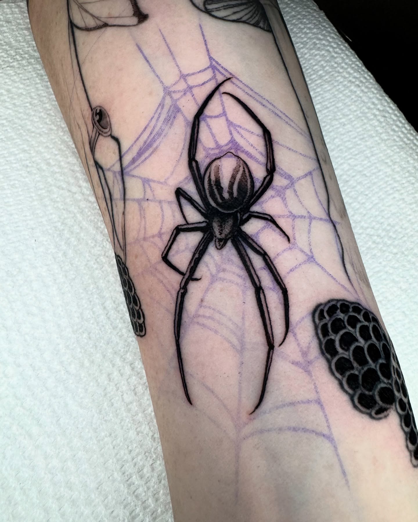 Spider web black and grey tattoo on the forearm by Angelo Buonanno, Las Vegas, Nevada