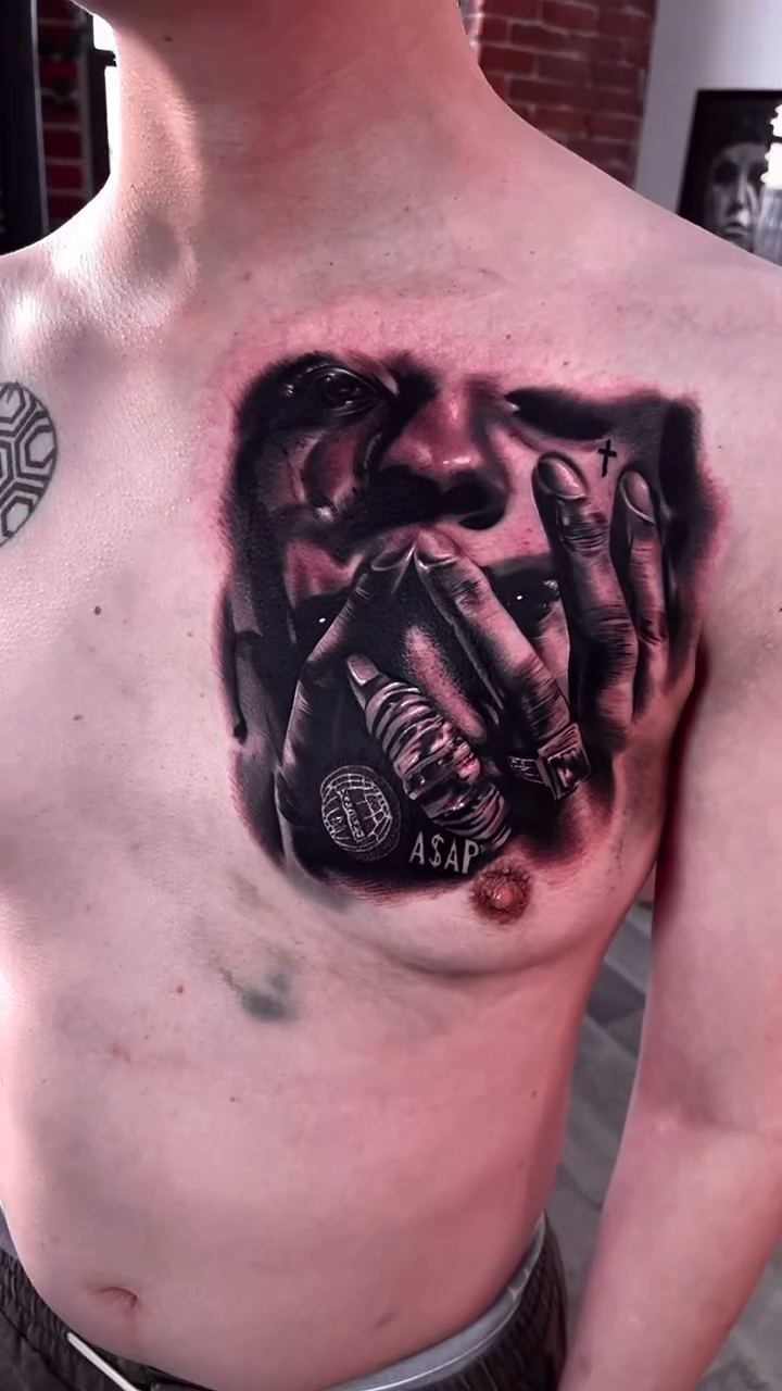 Man smoking cigar realism tattoo by Erick Gutierrez, Las Vegas, Nevada