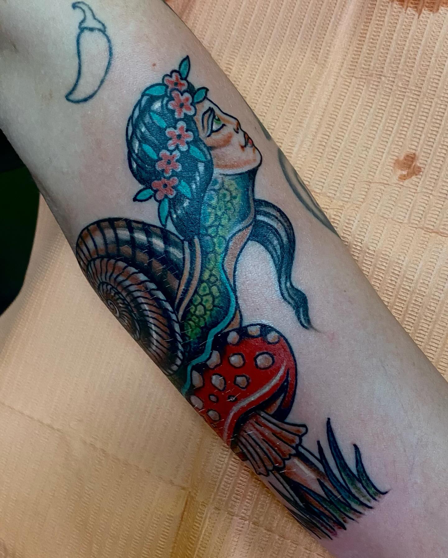 Mermaid American traditional tattoo on the forearm by Chase Skylar Clayton Ogle