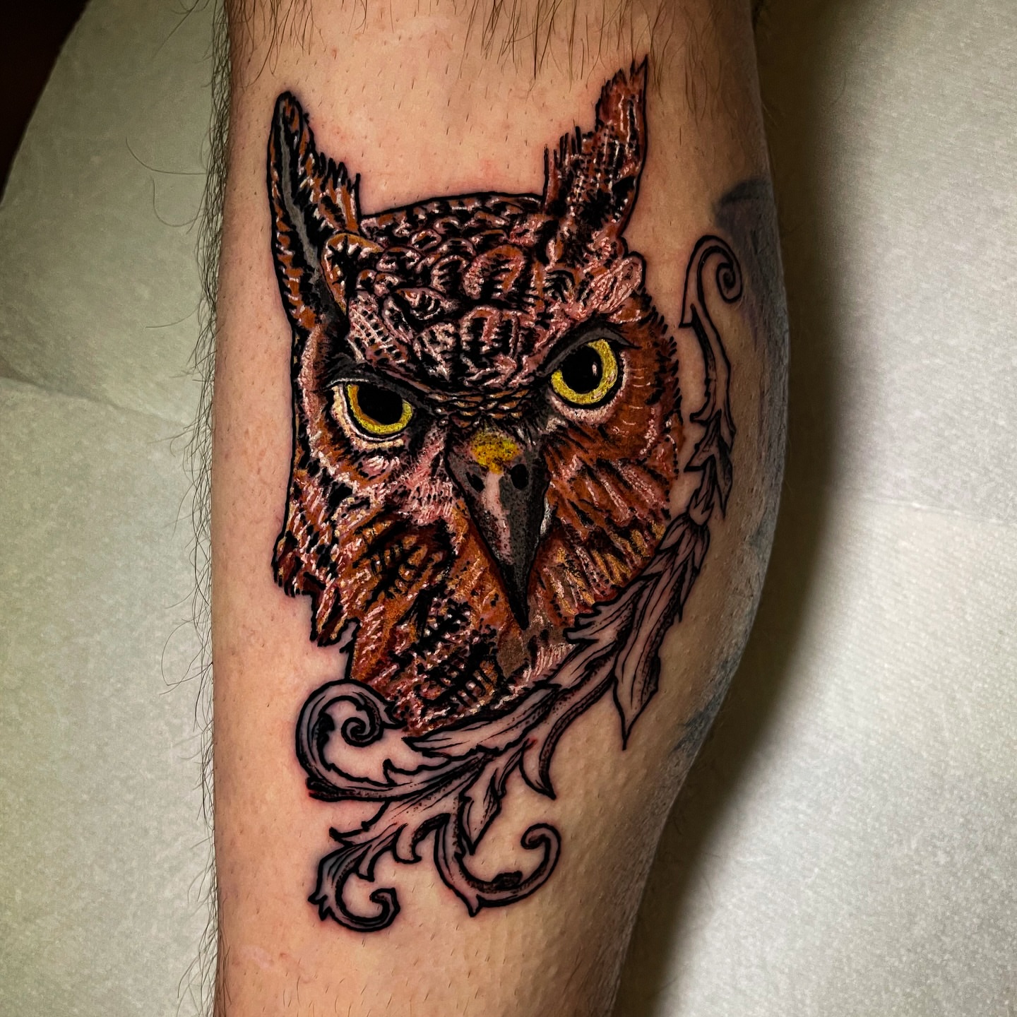 Owl realism tattoo on the forearm by Miguel Henrik