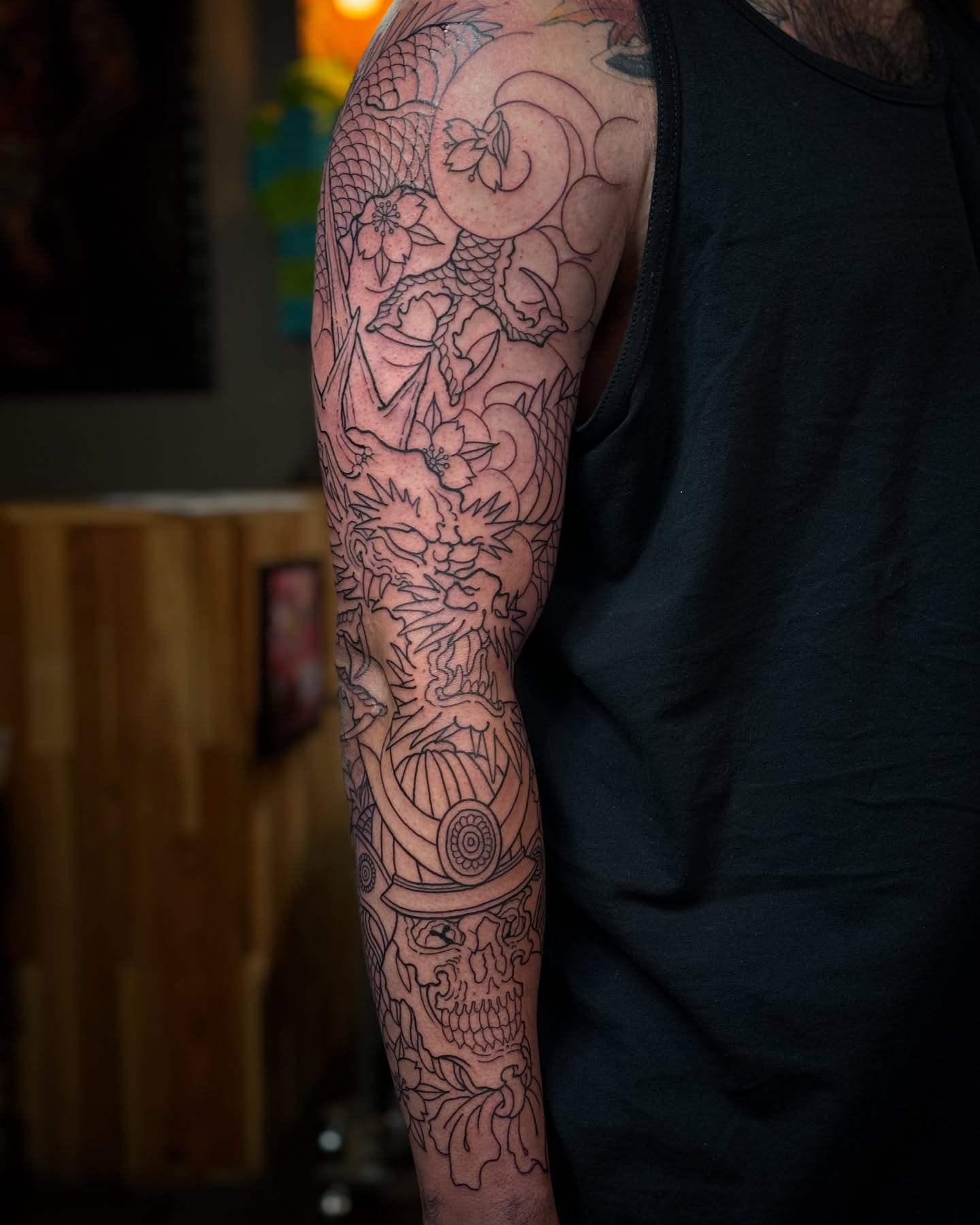 Dragon and floral japanese irezumi tattoo on the forearm by Tattooer by Trade Wannabe Artist at Heart