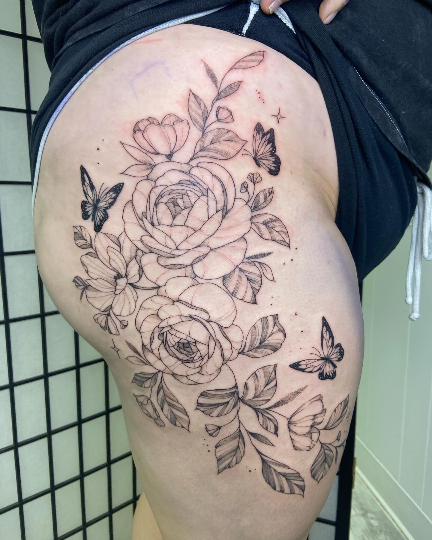 Floral bouquet black and grey tattoo on the thigh by Libbey June @ Snailberry Studios- NW OHIO