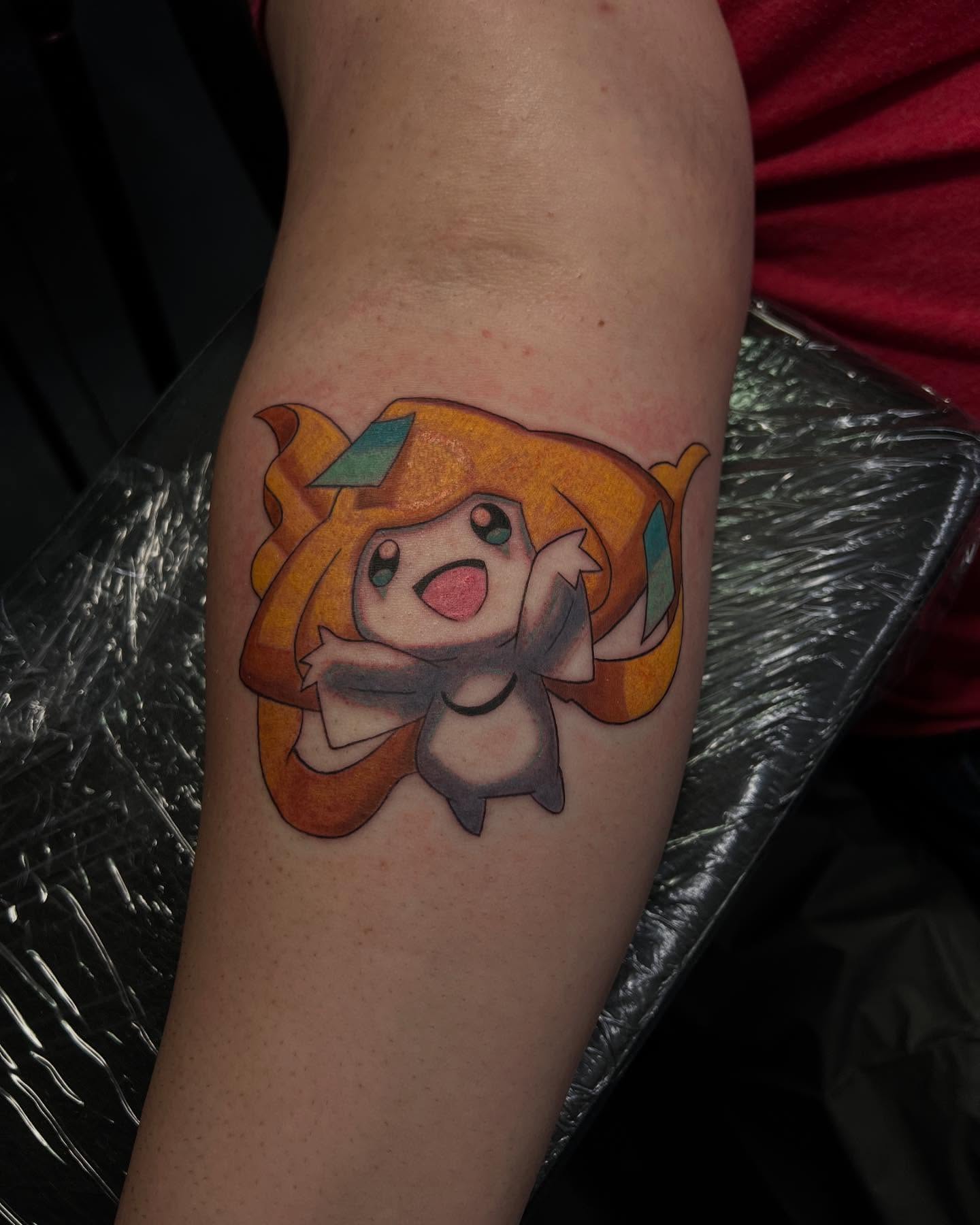 Anime character anime tattoo on the forearm by Daphne Landry