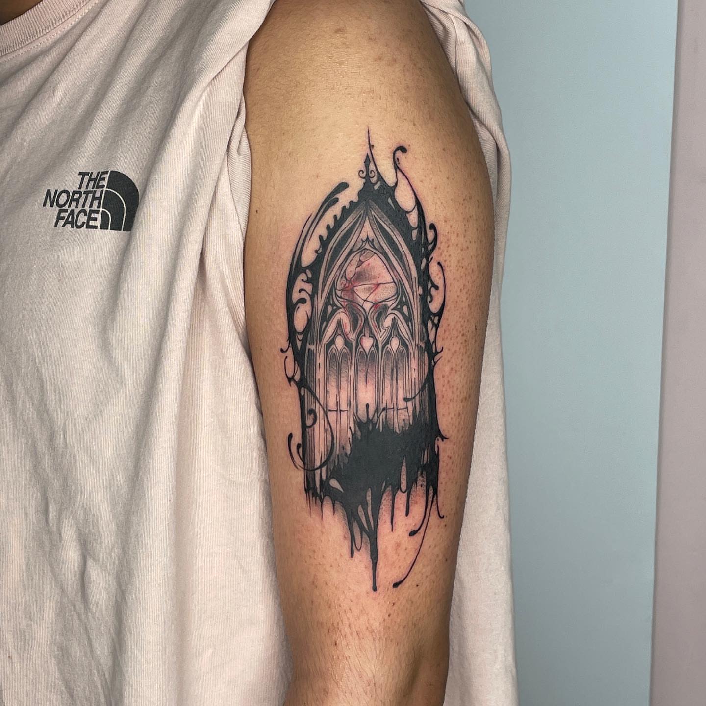 Gothic arch dark realism tattoo on the upper arm by Mia 	\(★ω★)